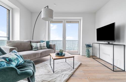 Olpenitz Apartment | Strandfeder – Moderne Ostsee-Ferienwohnung für Drei im OstseeResort Olpenitz