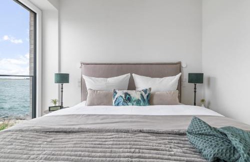 Olpenitz Apartment | Strandfeder – Moderne Ostsee-Ferienwohnung für Drei im OstseeResort Olpenitz