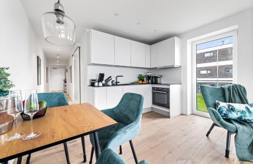 Olpenitz Apartment | Strandfeder – Moderne Ostsee-Ferienwohnung für Drei im OstseeResort Olpenitz