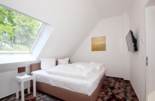 Lobbe Apartment | strandnahe FeWo mit Balkon, gratis Nutzung vom AHOI Erlebnisbad und Sauna in Sellin - Rex Rugia FeWo 10-6