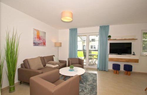 Lobbe Apartment | strandnahe FeWo mit Terrasse, gratis Nutzung vom AHOI Erlebnisbad und Sauna in Sellin - Rex Rugia FeWo 10-2