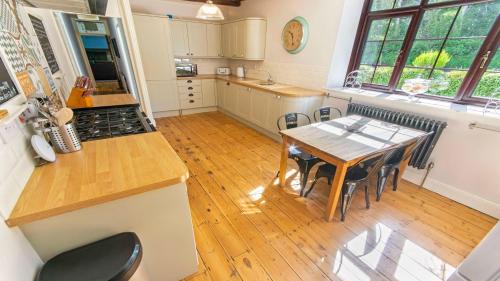 Georgeham House | Streamways Nr Croyde - Large country cottage with valley views, Hot Tub option and private garden cabin, sleeps 12-16
