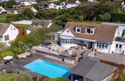 Trenance House | Stroll to beach, private pool, bar/bbq, hot tub, games+media room, dog friendly