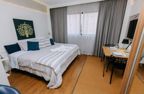 Batel Apartment | Studio Aconchegante no Batel Cama King WiFi e Estac