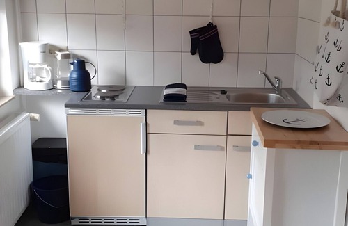 Bosbull Apartment | Studio Apartment 'Ferienwohnung Blauer Leuchtturm' with Private Terrace, Private Garden and Wi-Fi