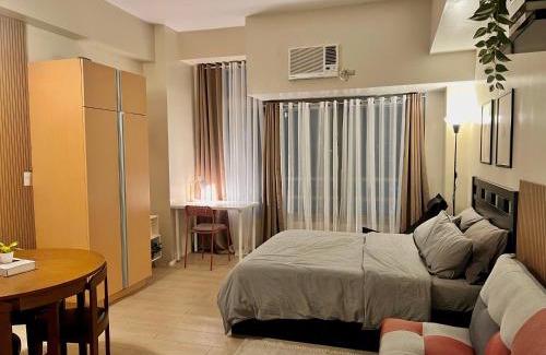 Bagumbayan Apartment | Studio in Eastwood City with Free Pool, Parking & Netflix