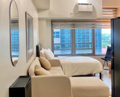 Bagumbayan Apartment | Studio in Eastwood City with Free Pool, Parking & Netflix