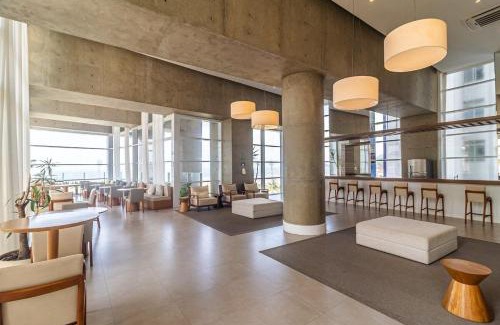 Pompeia Apartment | Studio moderno em condomínio de luxo pé na areia