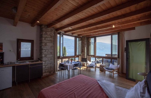 Tignale Apartment | Studio rustically furnished, overlooking lake and with terrace