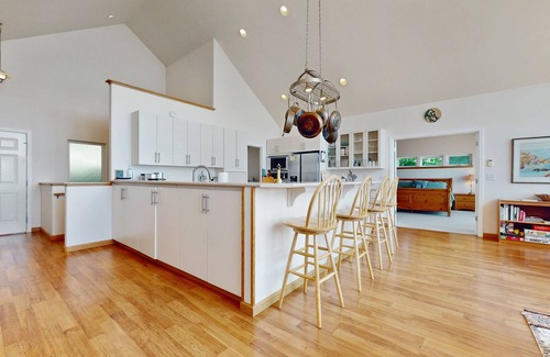 Greenbank House | Stunning 2 level waterfront home with firepit, WiFi, views, and pool table