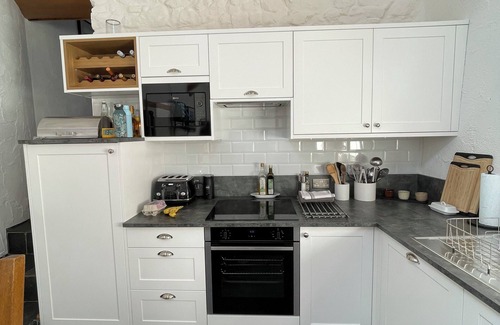 Crynant House | Stunning 300 year old restored barn in Gower near the beach