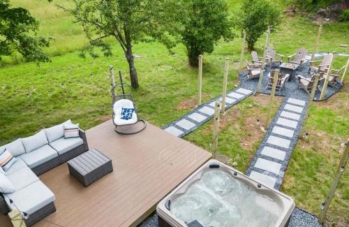East Stroudsburg House | Stunning 4BR 4BA Luxury Home with Hot Tub Game Room & Fire Pit Sleeps 12