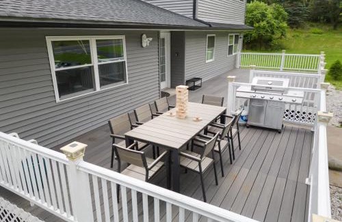 East Stroudsburg House | Stunning 4BR 4BA Luxury Home with Hot Tub Game Room & Fire Pit Sleeps 12