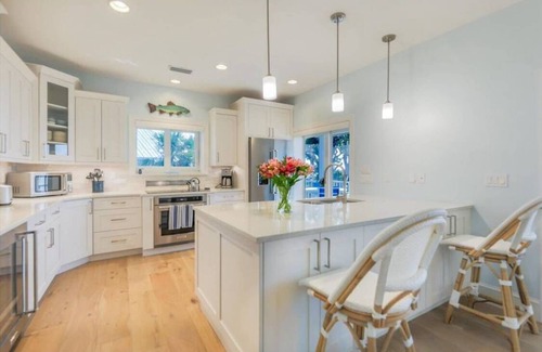 Sanibel House | Stunning Beachfront Villa with Heated Pool