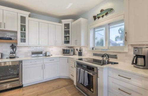 Sanibel House | Stunning Beachfront Villa with Heated Pool