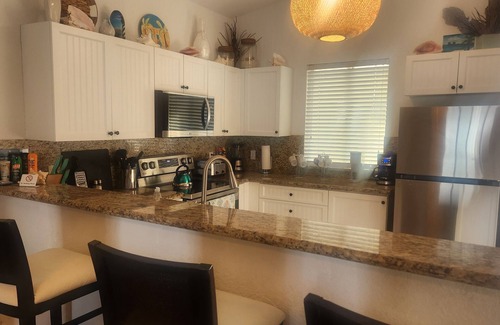 Alice Town Condo | Stunning Caribbean Ocean Views Centrally Located - Golf Cart Optional