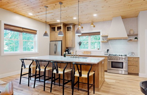 Foscoe Cottage | Stunning dog-friendly cottage with riverfront patio, hot tub, fire pit, & views