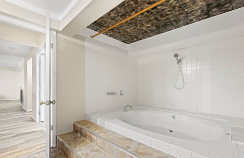 Hampden South Condo | Stunning DTC Condo: Mountain Views, Pool, Parking!
