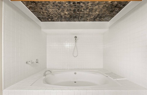 Hampden South Condo | Stunning DTC Condo: Mountain Views, Pool, Parking!