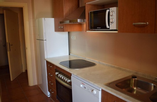 L Almadrava Apartment | Stunning Duplex with Pool, Solarium, and Parking Near Beautiful Coves