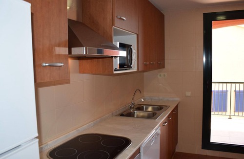 L Almadrava Apartment | Stunning Duplex with Pool, Solarium, and Parking Near Beautiful Coves