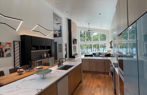 Jay House | Stunning lake front new construction home in the heart of drowning creek.
