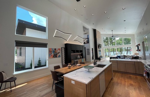 Jay House | Stunning lake front new construction home in the heart of drowning creek.