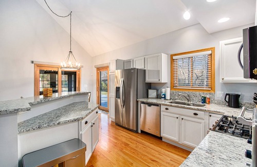 Grand Beach House | Stunning lake retreat with private pool, hot tub, games, firepit, & lovely patio