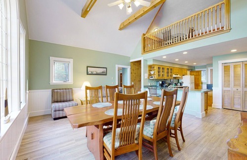 Moultonborough House | Stunning lakefront property with beach access, a dock, spacious yard, & W/D