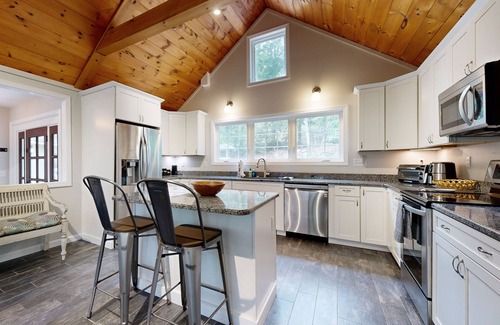 Harrison House | Stunning lakefront gem with water access, dock, 2 kayaks, firepit & private W/D