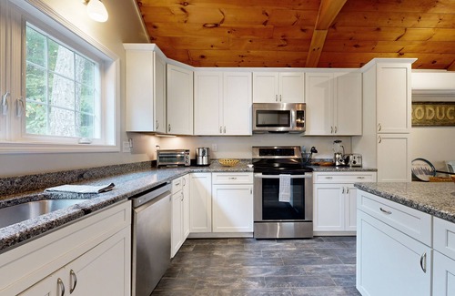 Harrison House | Stunning lakefront gem with water access, dock, 2 kayaks, firepit & private W/D