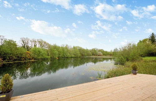 Menai Bridge Ski Chalet | Stunning lodge built over the edge of the lake.