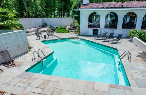 Milledgeville House | Stunning Mediterranean Style Lakefront, Sleeps 8! Private Dock, Pool, + Kayaks!