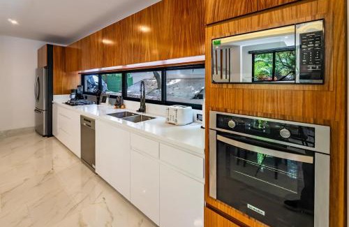 Playacar Fase I Apartment | Stunning modern villa with pool and beach access