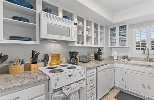 Wrightsville Beach Condo | Stunning pool and ocean views await you in this beautiful, convenient condo.