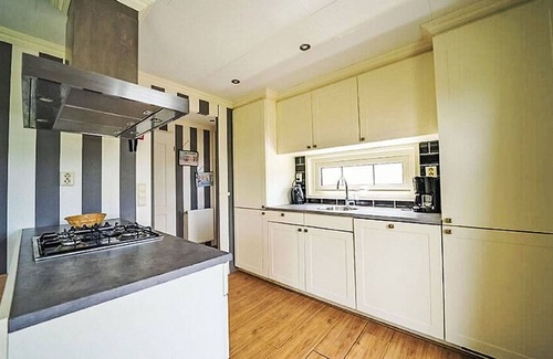 Dordtse Biesbosch House | Stunning private villa for 4 people with pool, WIFI, TV, terrace and parking