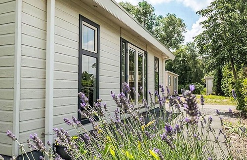 Dordtse Biesbosch House | Stunning private villa for 4 people with pool, WIFI, TV, terrace and parking