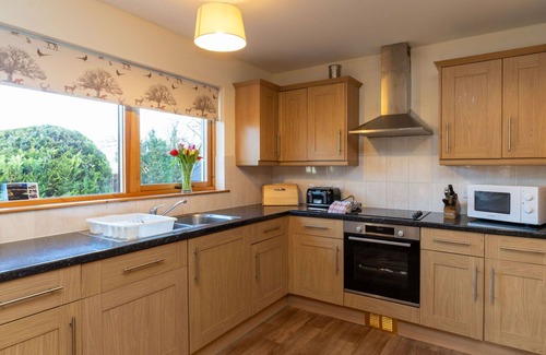 Aviemore Villa | Stunning private villa for 14 guests with WIFI, hot tub, TV, patio, pets allowed and parking