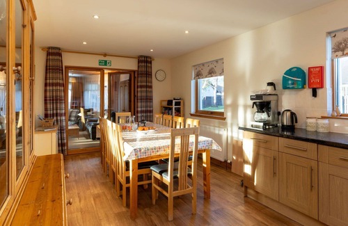 Aviemore Villa | Stunning private villa for 14 guests with WIFI, hot tub, TV, patio, pets allowed and parking
