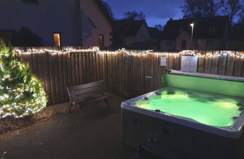 Aviemore Villa | Stunning private villa for 14 guests with WIFI, hot tub, TV, patio, pets allowed and parking