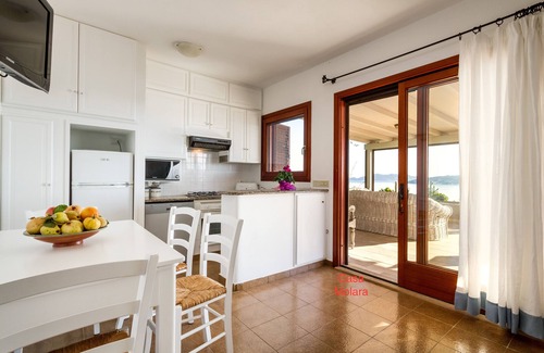 Porto Taverna Apartment | Stunning view near the beach with large panoramic veranda MOLARA house