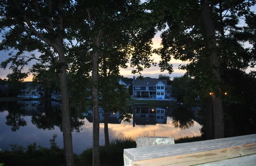 Croatan Beach House | Stunning view of Lake Christine w/a 3-min walk to Croatan beach!