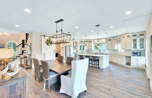 Palm City House | Stunning Water Front River House with Gourmet Kitchen & Large Boat Dock!
