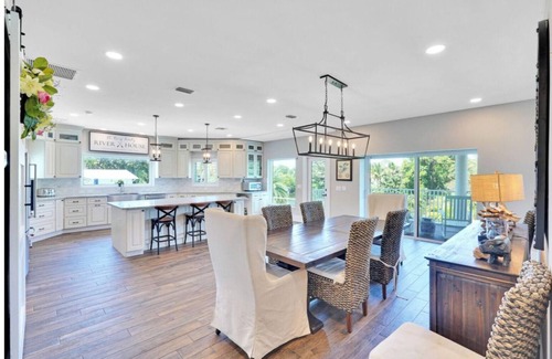 Palm City House | Stunning Water Front River House with Gourmet Kitchen & Large Boat Dock!