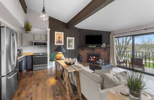 Lake Geneva Condo | Stunning Waterfront views & cozy fireplace on the shores of Lake Como. King bed.