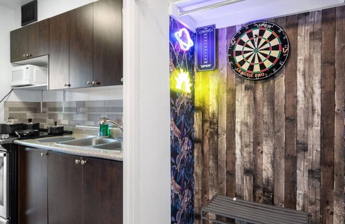 Applewood Apartment | Stylish 1BR with King Bed, Patio, Dart Room, and Free Parking – 10 min to SQ1