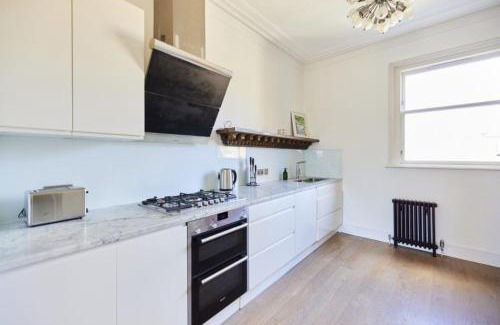 Harrow Road Apartment | Stylish 3BR Home with Private Patio in Maida Vale
