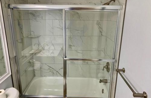 Trailer Estates Apartment | Stylish and Modern Shorewalk condo close to top beaches, heated pools, hot tub, IMG Academy, dining