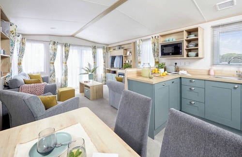 Ludchurch House | Stylish and spacious 12ft-wide caravan with one double and two twin.