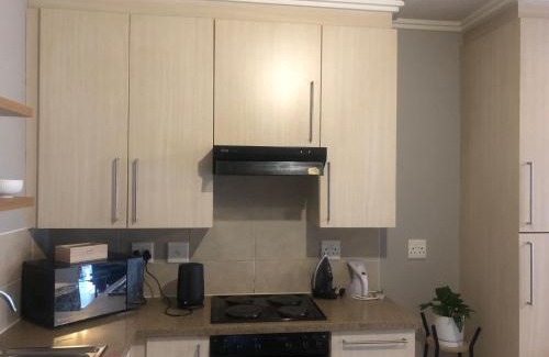 Lone Hill Apartment | Stylish Bachelor Pad in the Heart of Fourways